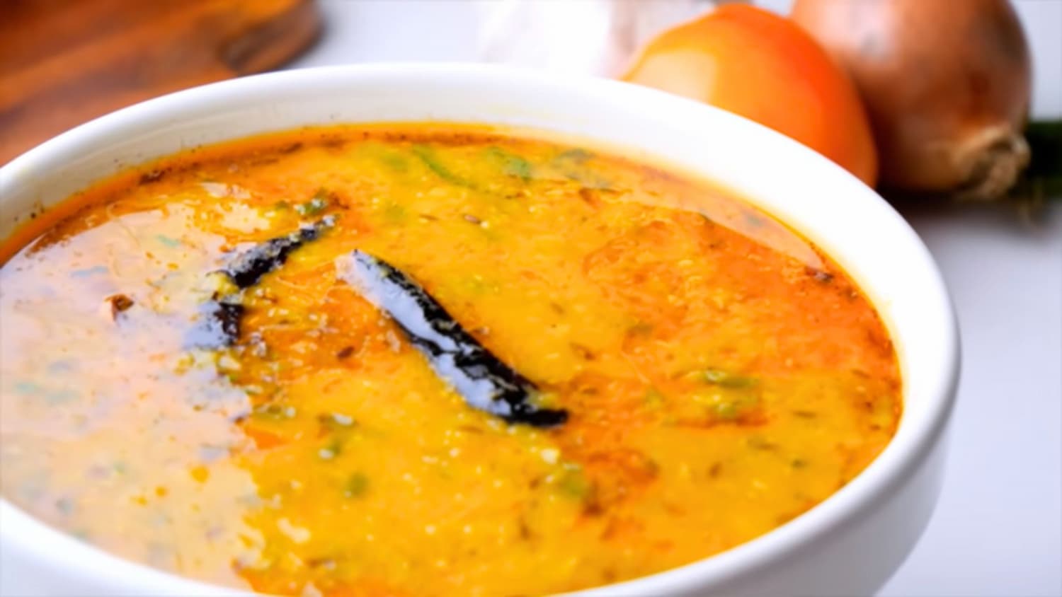 masoor dal or red lentil curry in a serving bowl