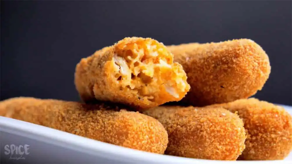 chicken cheese fingers on a serving plate