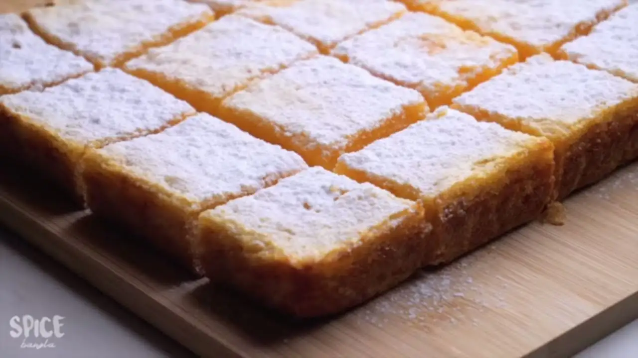 Lemon Bars or tart on a serving board