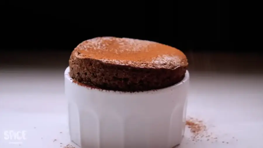 Best Chocolate Souffle in a ramekin on a surface