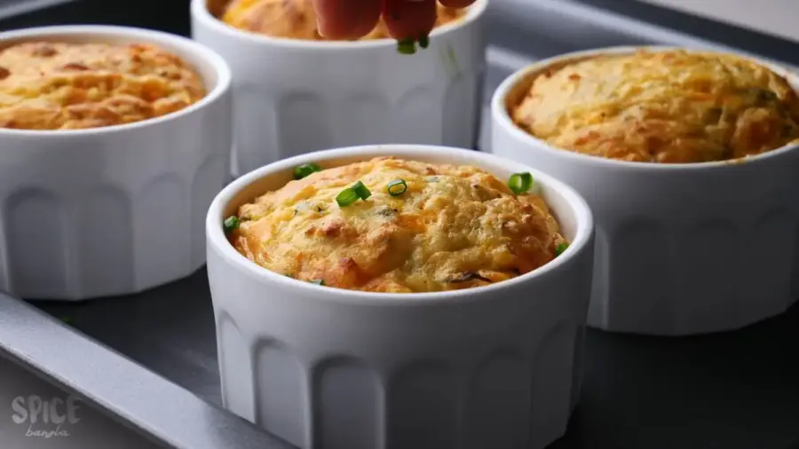 Potato Souffle in ramekins on a baking tray