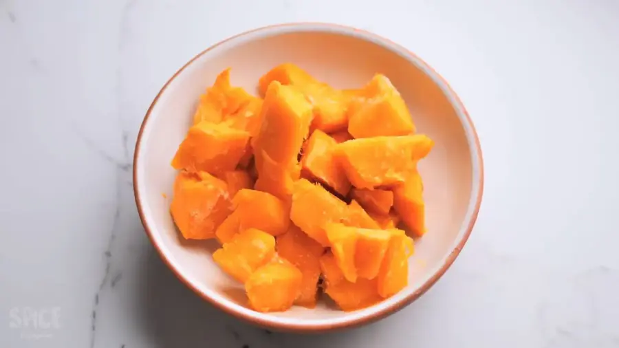 1-Minute Mango Smoothie recipe ingredients frozen mangoes in a bowl