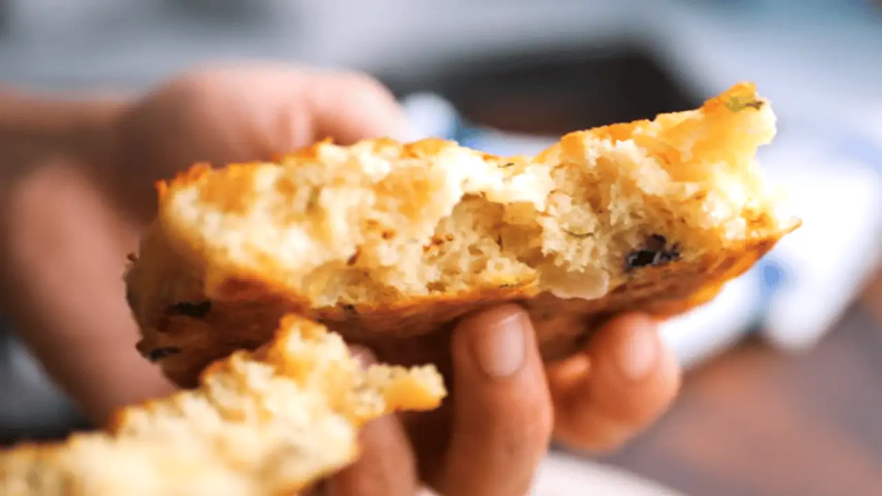 Piece of savory pancakes breaks into half