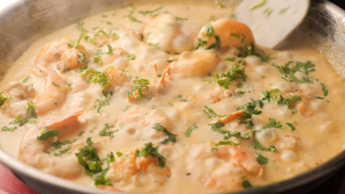 creamy garlic shrimp in a large pan 