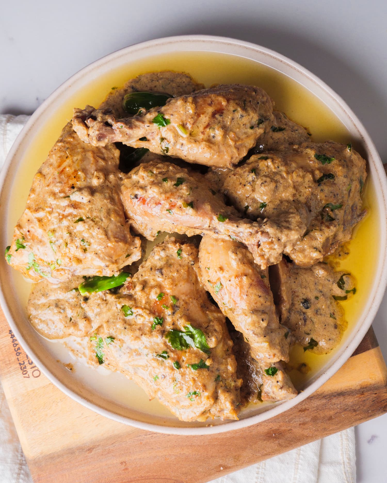 lemon pepper chicken on a serving plate