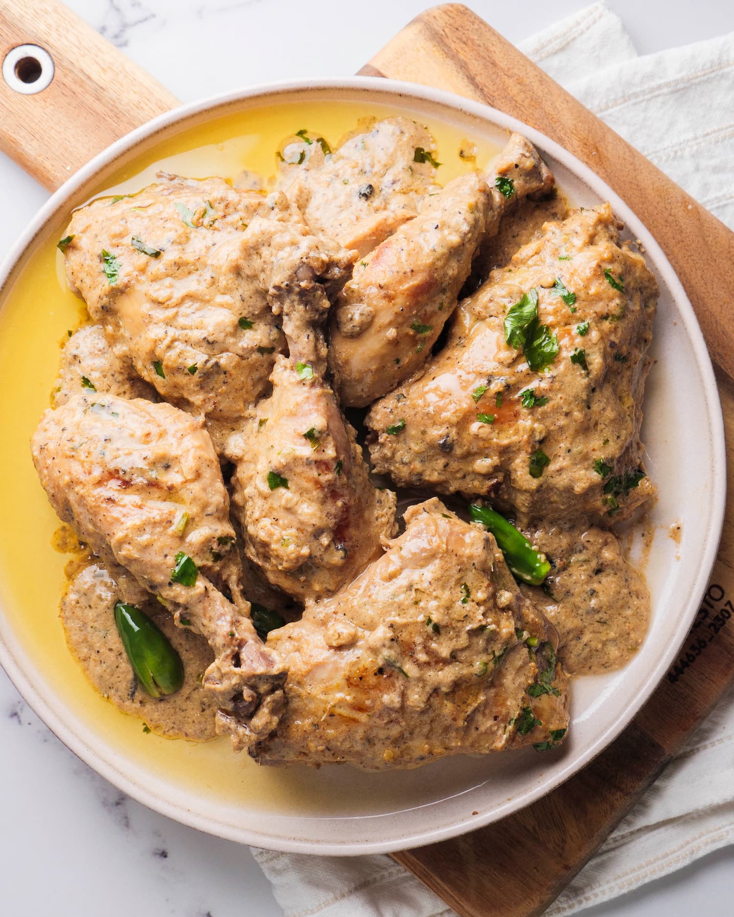 lemon pepper chicken on a serving plate