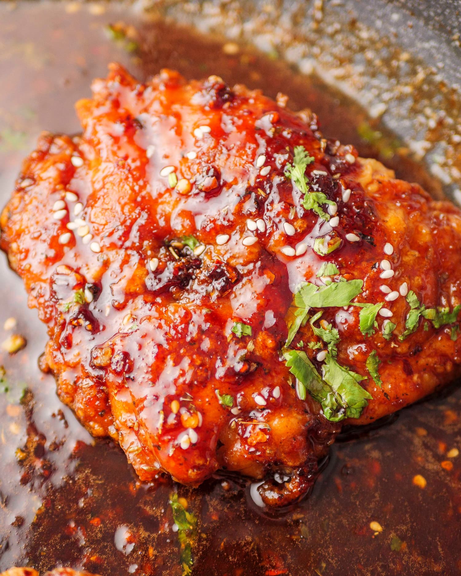 honey garlic chicken piece in a pan