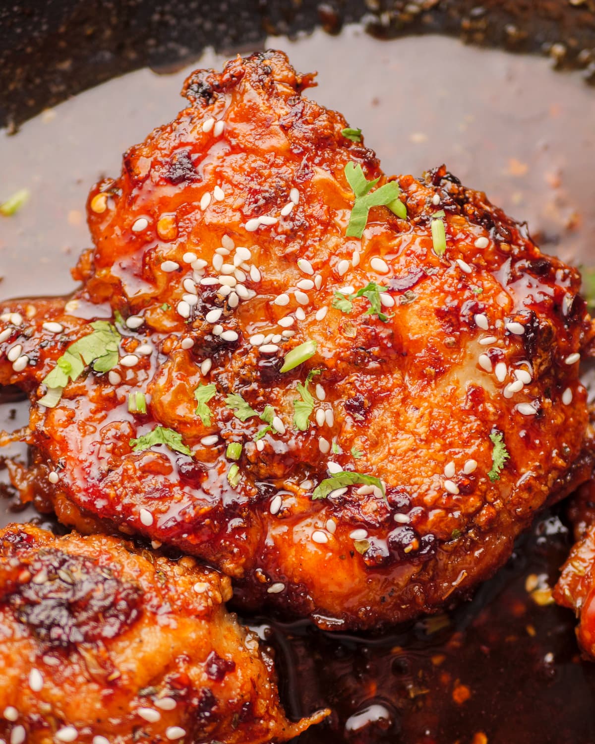 honey garlic chicken piece in a pan