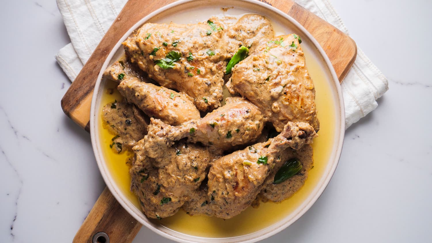 lemon pepper chicken on a serving plate