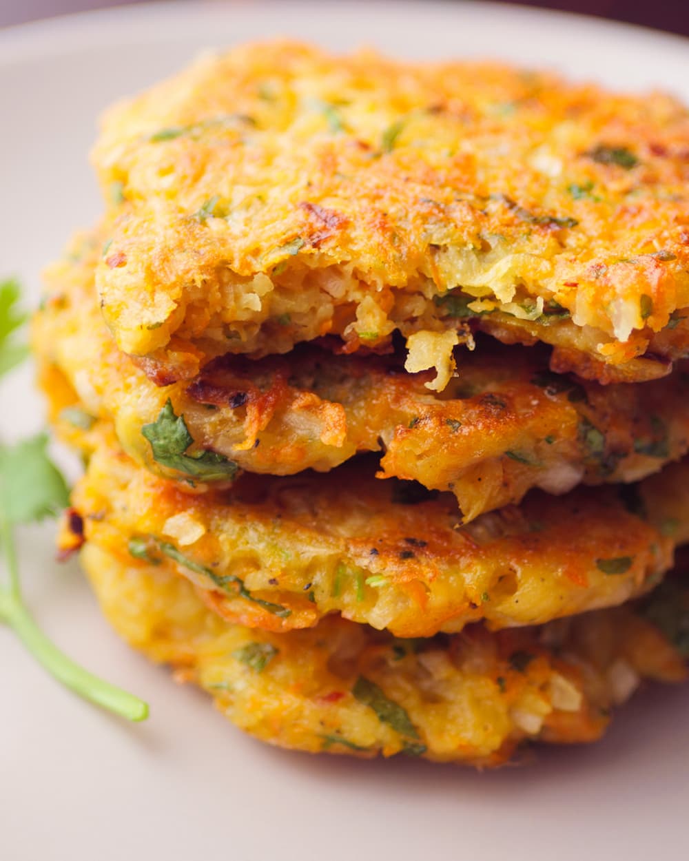 stakes of potato and carrot fritters