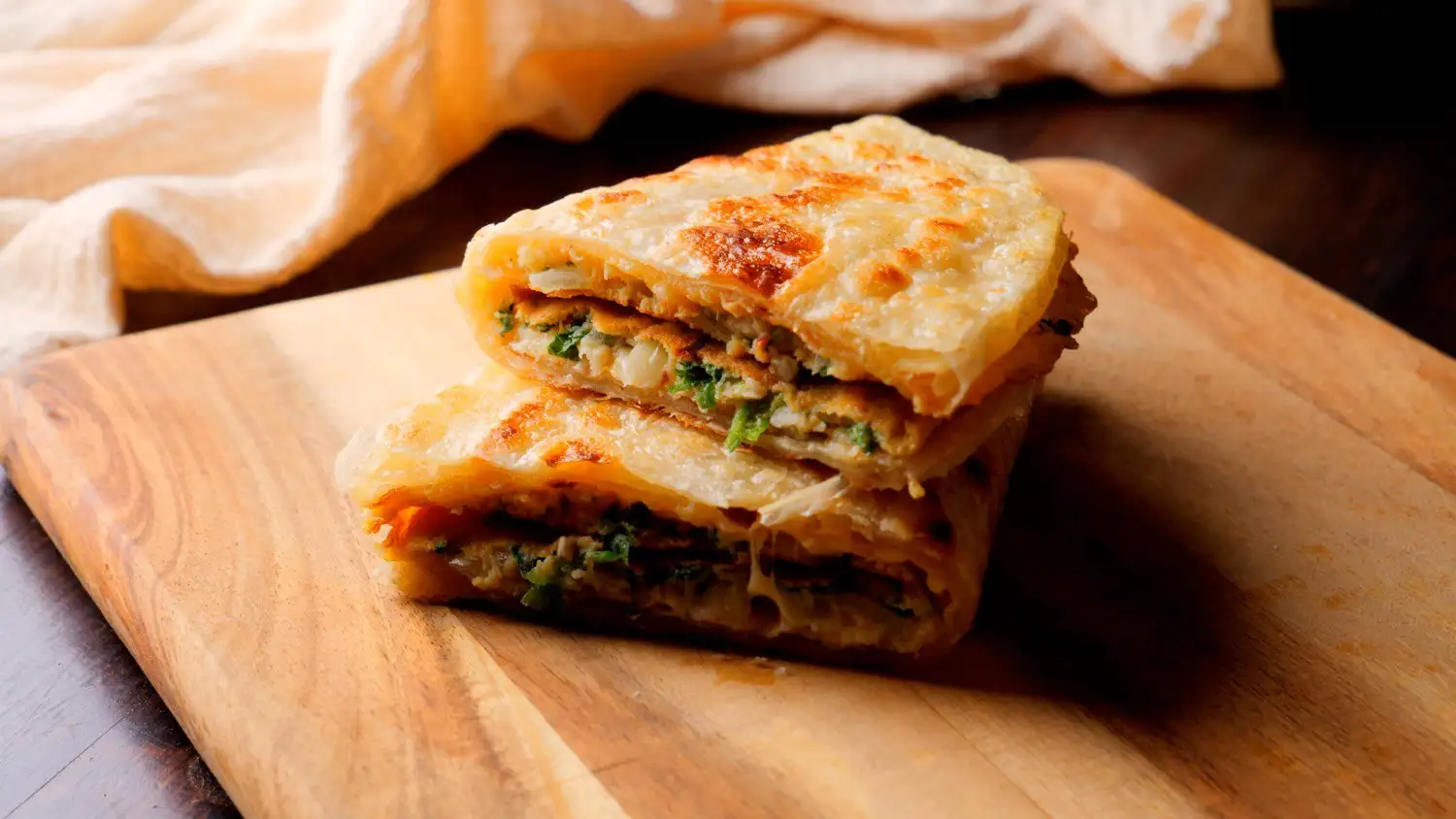 Cheese Paratha recipe on a board