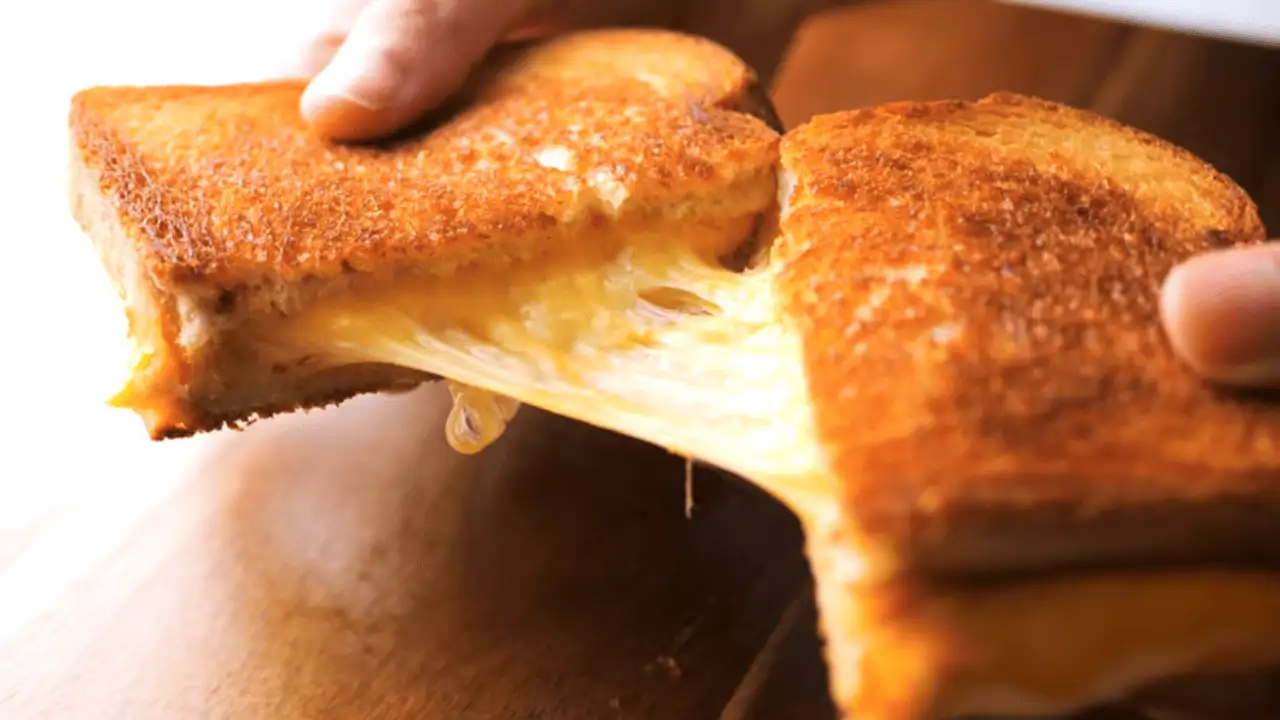 Grilled Cheese Sandwich Recipe placing on a board