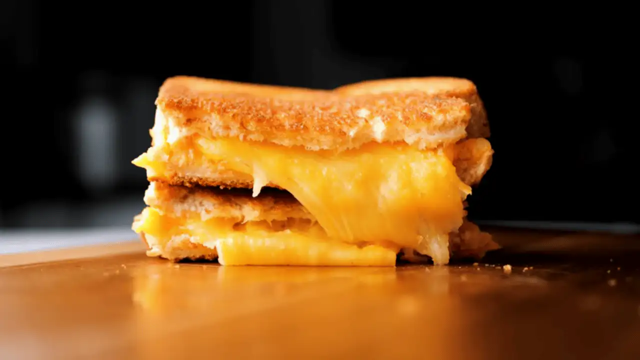 Grilled Cheese Sandwich Recipe placing on a board