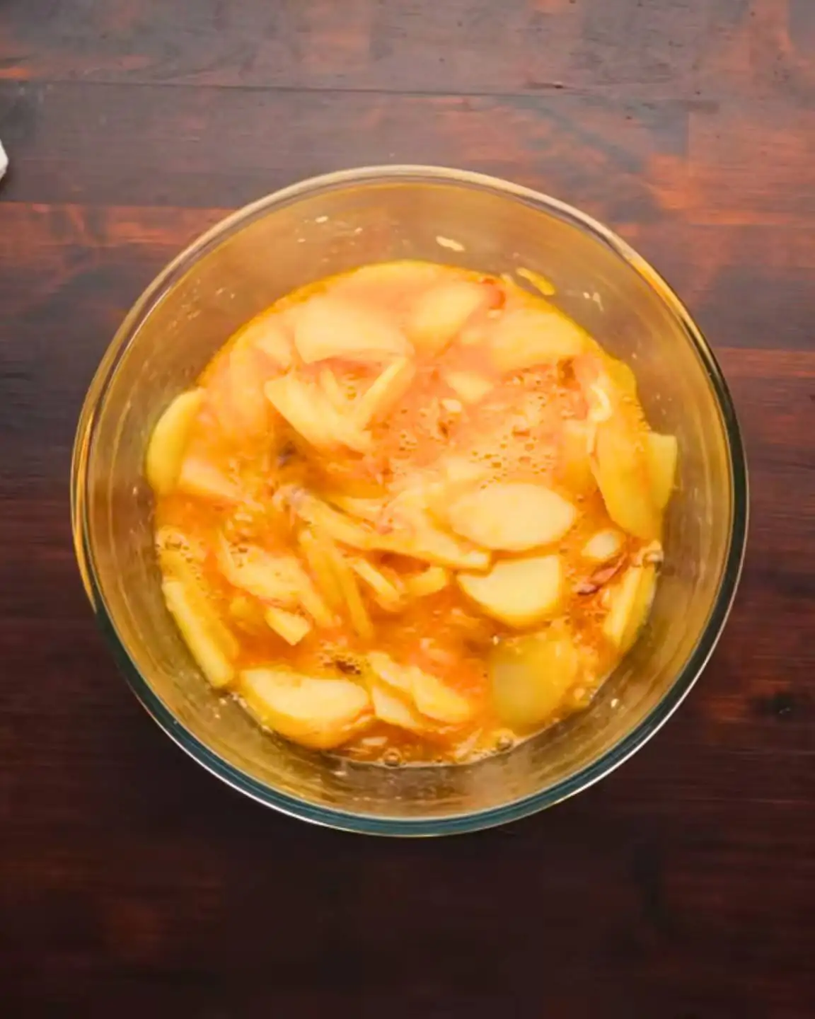 tortilla de patatas or Spanish omelette mixture in a bowl