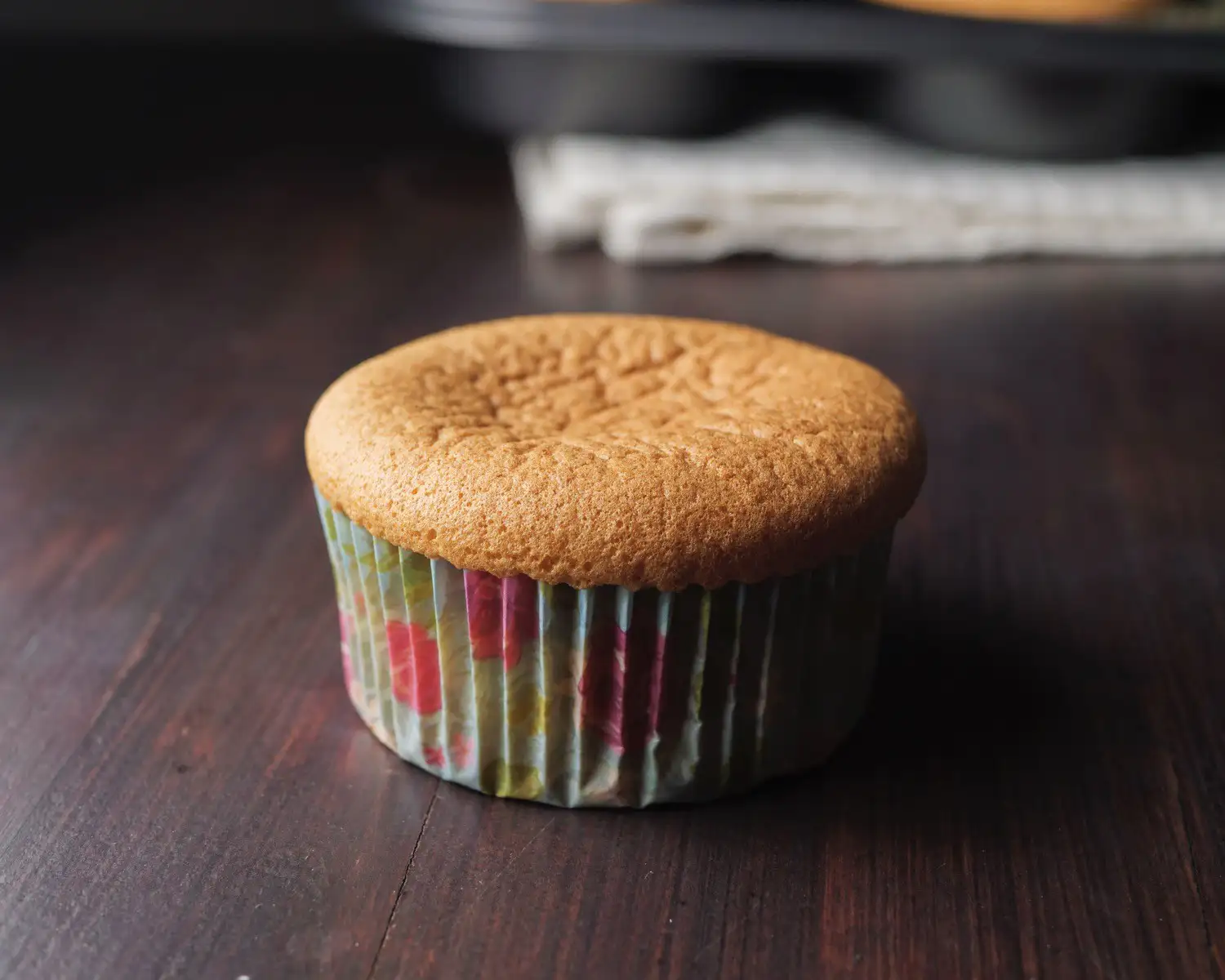 a piece of Chiffon Cupcake place on a board