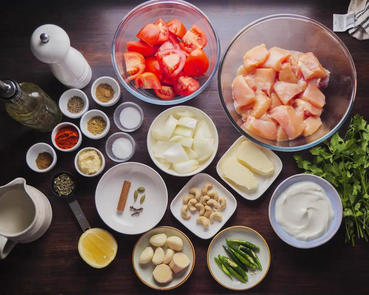 Butter Chicken Recipe Ingredients on a surface