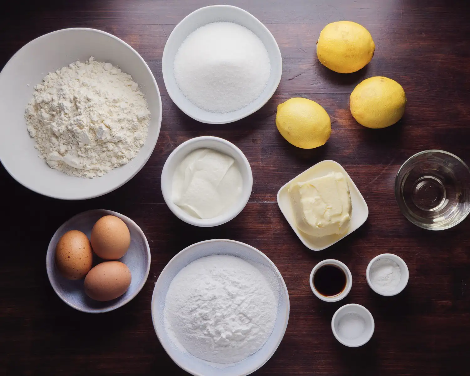 Lemon Loaf Cake Recipe Ingredients on a surface