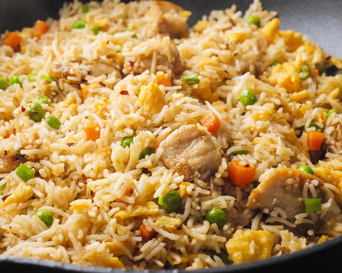 Garlic Chicken Fried Rice on a frying pan