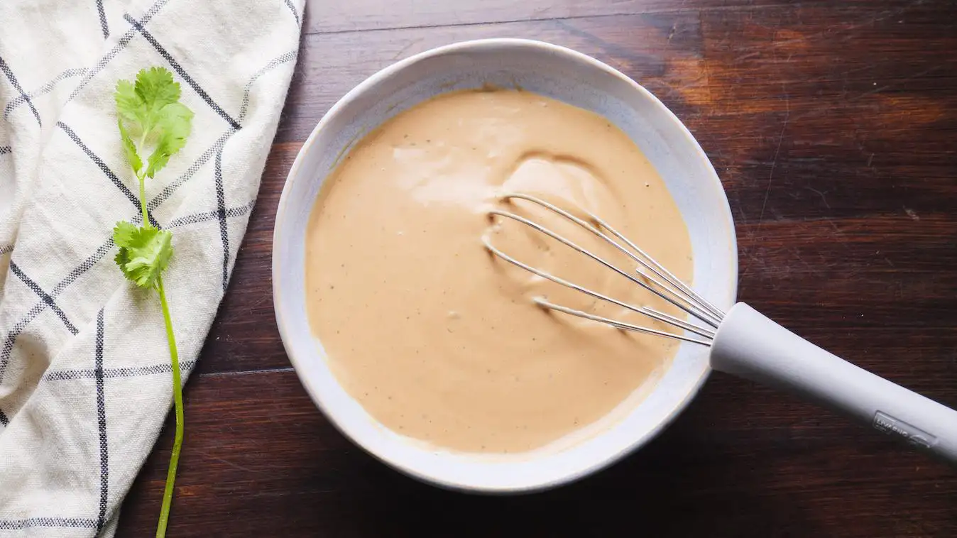 Raising Cane's Sauce Recipe in a bowl with a whisk