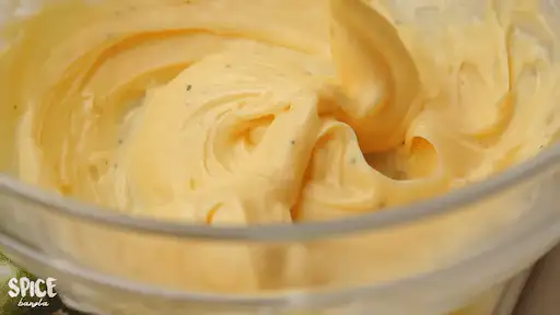 Homemade Mayonnaise Recipe on a mixing bowl