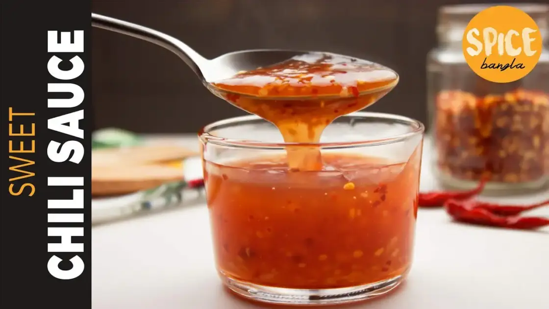 Sweet Chili Sauce Recipe on a jar with a spoon