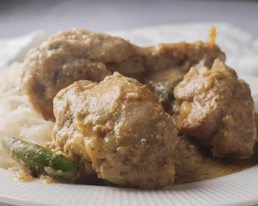 Chicken Korma serving on a plate with basmati rice