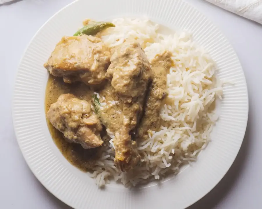 Chicken Korma serving on a plate with basmati rice