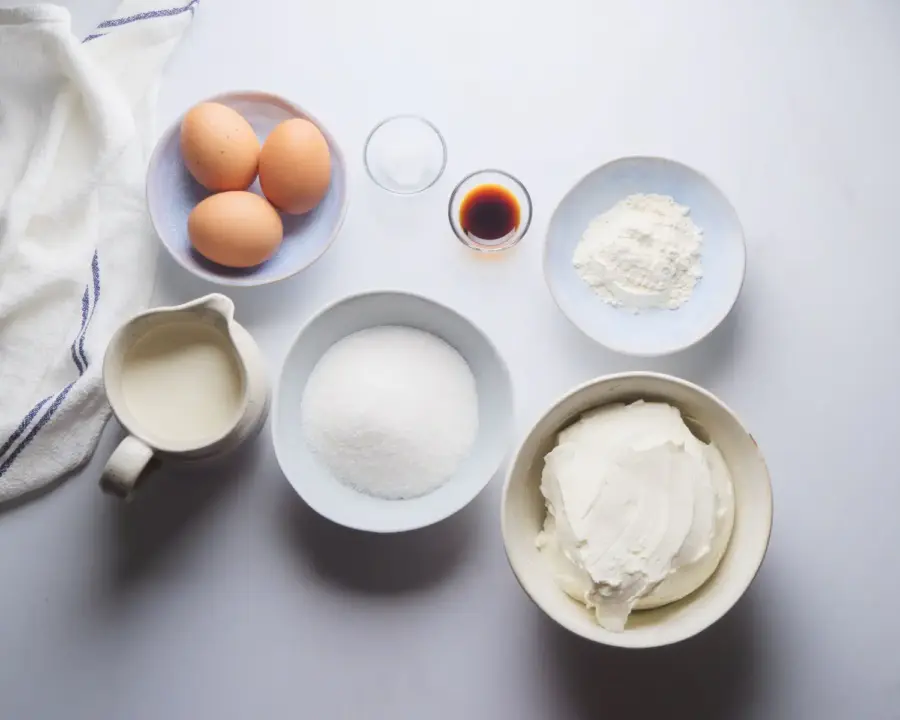 Loaf Pan Basque Cheesecake Recipe Ingredients on a surface