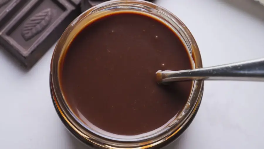 Hot Fudge Sauce recipe into a jar 
