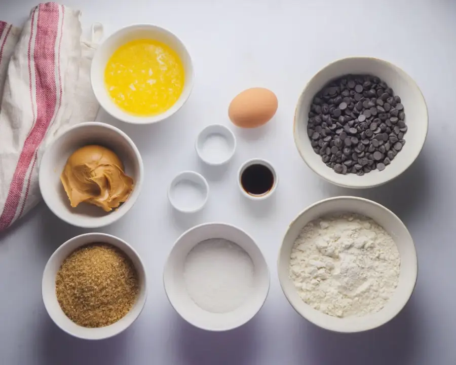 Peanut Butter Chocolate Chip Cookies Ingredients on a kitchen counter