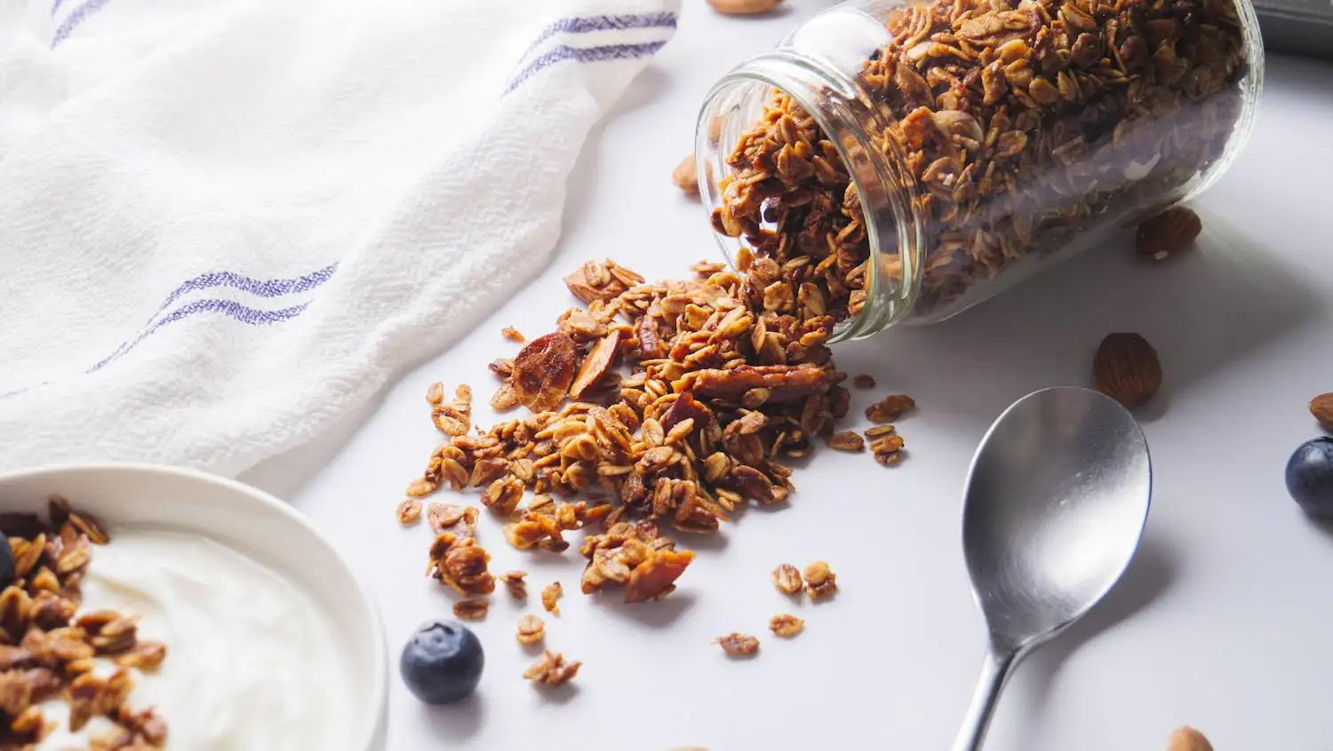 Vanilla Almond Granola On a serving area with a spoon