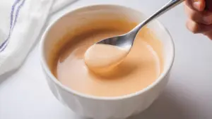 Yum Yum Sauce Recipe on a bowl with a spoon