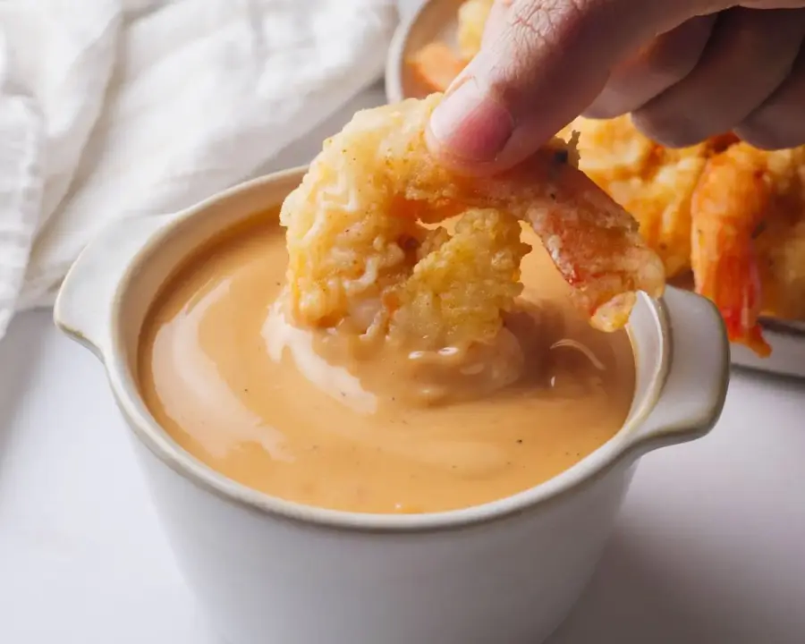 Boom Boom Shrimp Sauce in a ramekin with shrimps