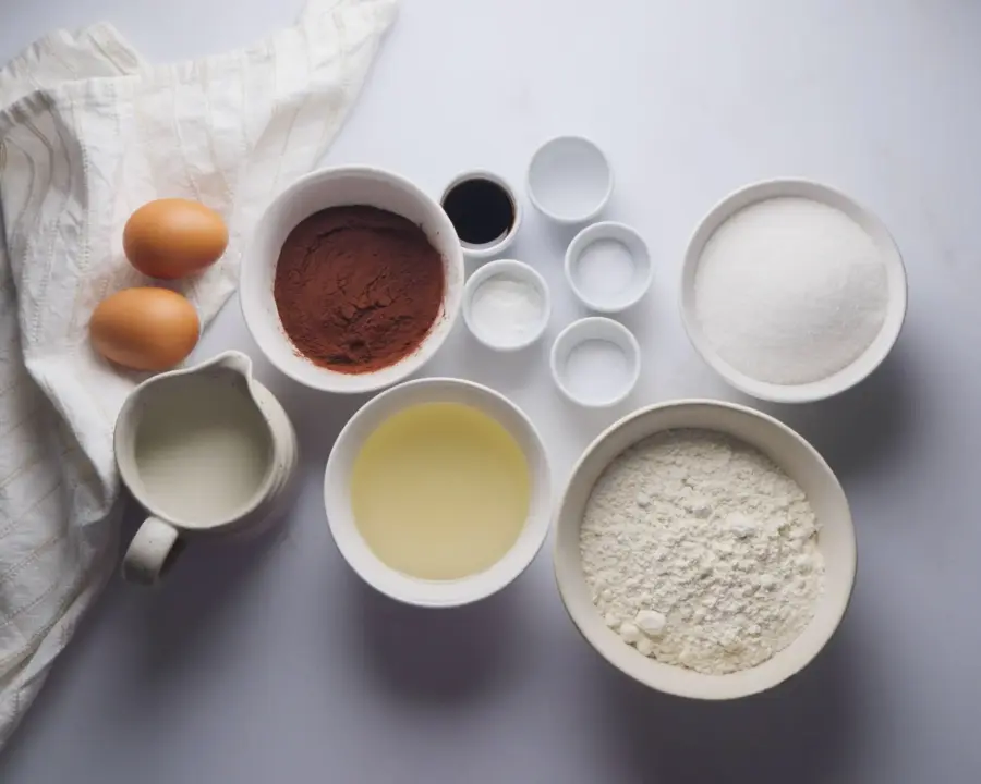 Chocolate Cupcakes Recipe Ingredients on a kitchen countertop