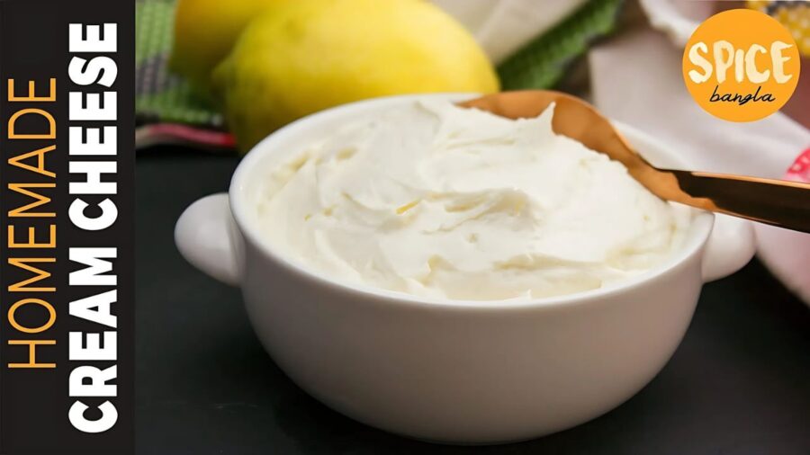 Homemade Cream Cheese in a serving bowl with a spoon